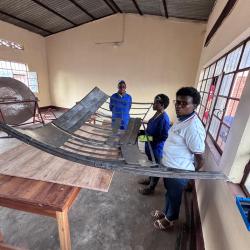 V2SDF training progresses as educators affix the thin support sheeting to the parabolic skeleton of the new model.