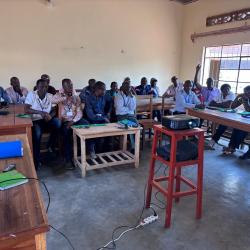 Educators collaborate to create formal training manuals and student guides for solar cooker fabrication courses.