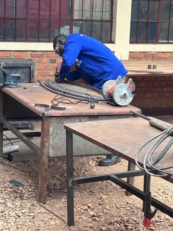 V2SDF training expands expertise as educators master profile bending for a new parabolic cooker model.